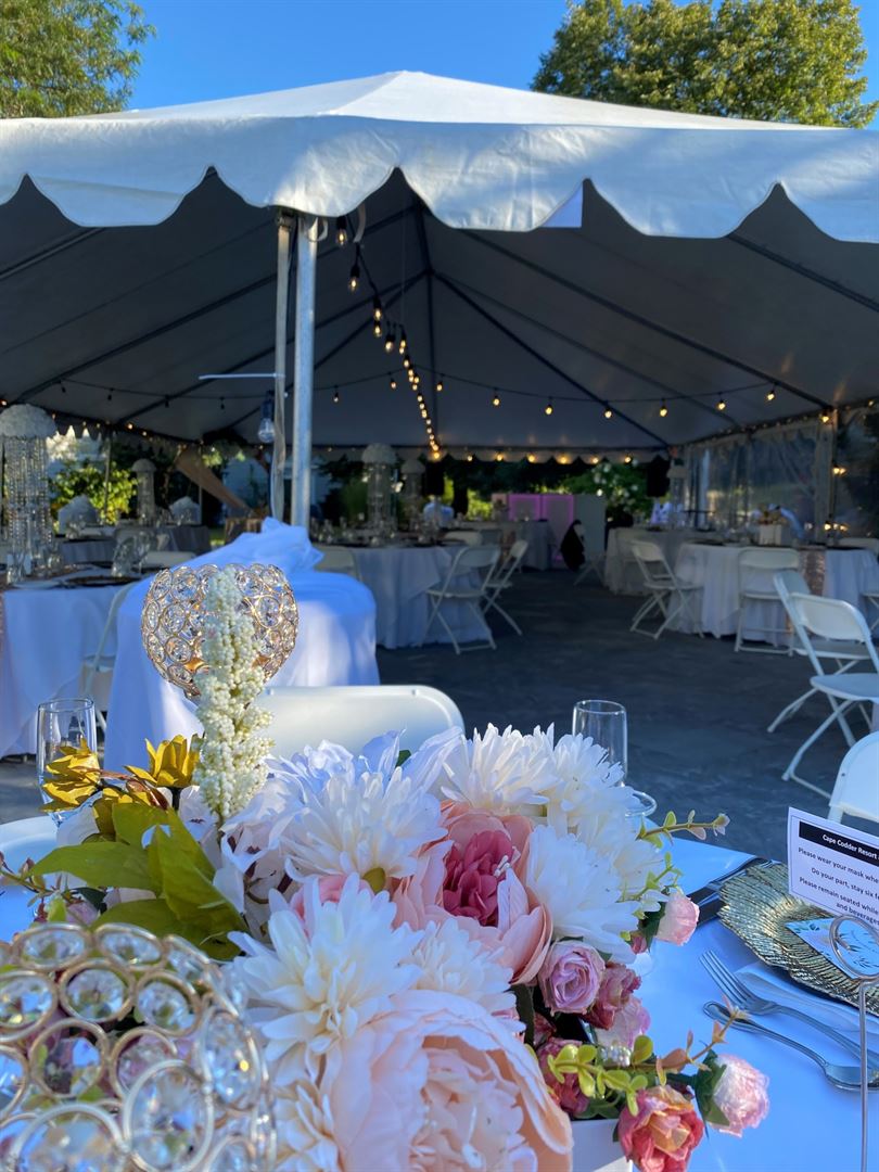 Wedding floral and tent setup